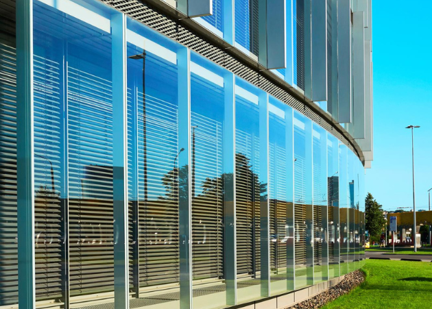 Commercial glass façade installation for modern office building