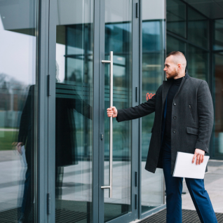 Commercial glass door installation for modern building entrance